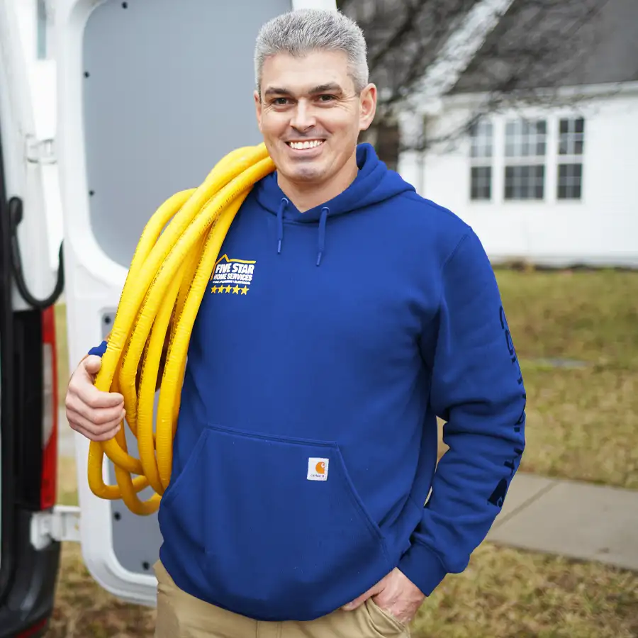 Plumber holding tubing